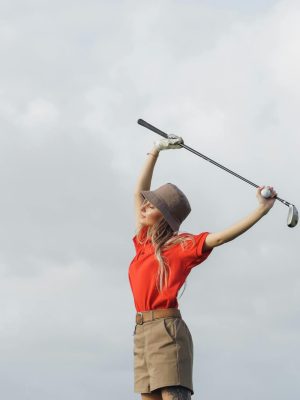 A Woman Holding a Golf Club