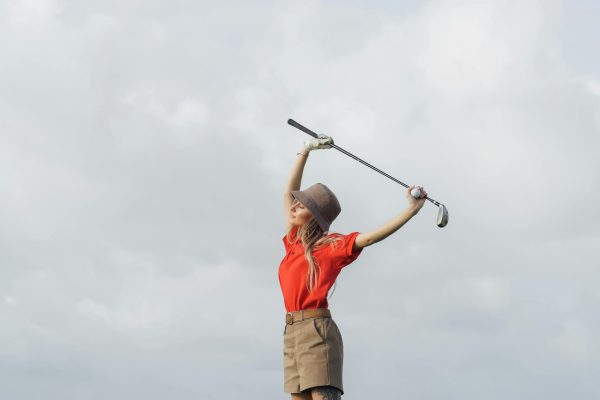 A Woman Holding a Golf Club