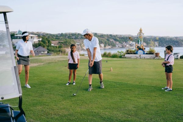 Happy Family Playing Golf